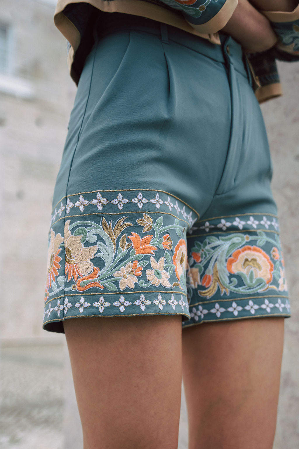 Amara Blue embrodiered shorts with indian inspired embroidery along the hem